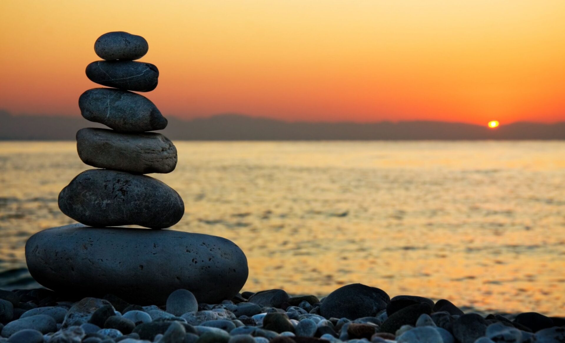 Photo of meditation rocks that can help you stay calm in turbulent times.