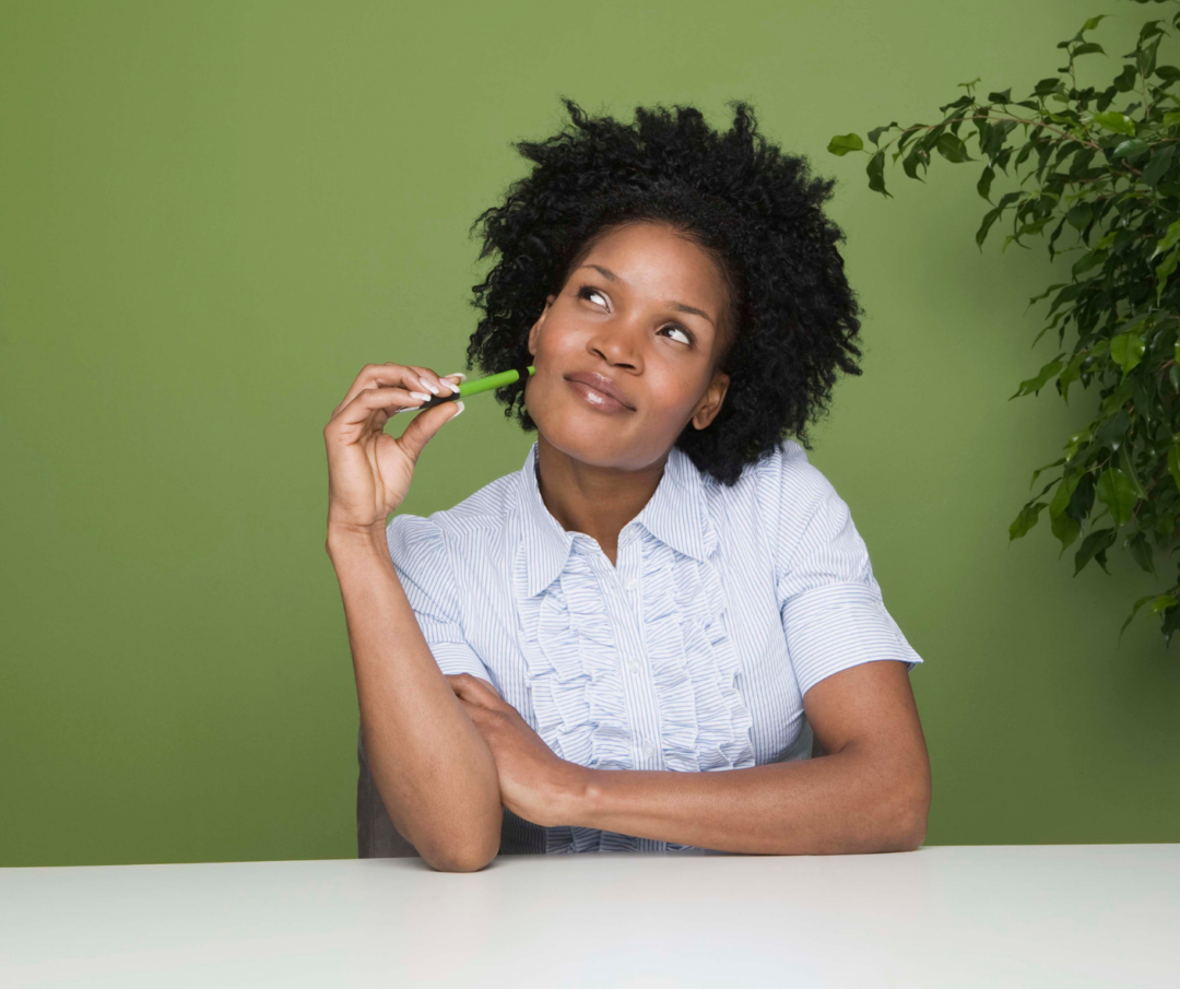 personality tests are fun at any age; woman pondering which test to take.